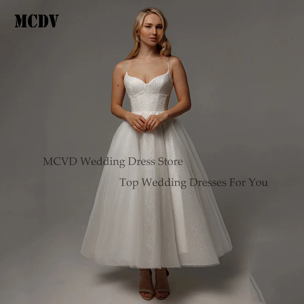 MCDV Sparkling Wedding Dress Spaghetti Straps V-Neck Glitter Tulle Midi Bride Gowns Customized Corset Simple Robe De Mariée 
MCDV Sparkling Wedding Dress Spaghetti Straps V-Neck Glitter Tulle Midi Bride Gowns Customized Corset Simple Robe De Mariée