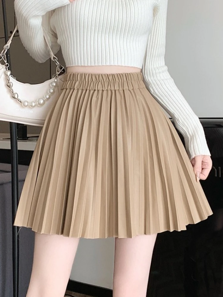 REALEFT винтажные женские плиссированные юбки из искусственной кожи, новинка 202, осень-зима, однотонные повседневные мини-юбки трапециевидной формы в стиле ретро с высокой талией для женщин
REALEFT винтажные женские плиссированные юбки из искусственной кожи, новинка 202, осень-зима, однотонные повседневные мини-юбки трапециевидной формы в стиле ретро с высокой талией для женщин