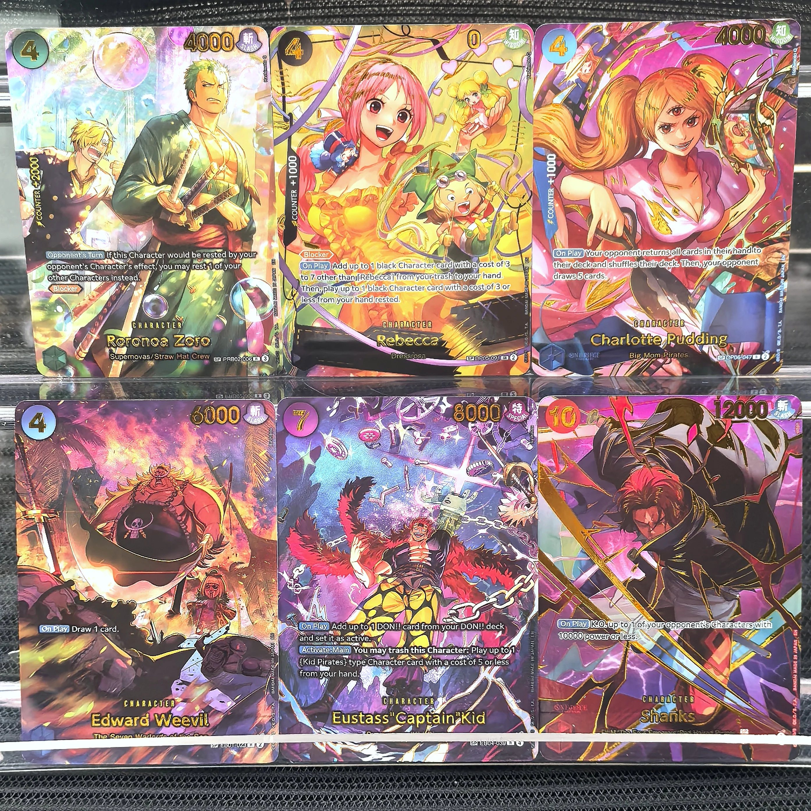 One Piece OP Card Game Collection Roronoa Zoro,Rebecca, Charlotte Pudding,Edward Weevil, Eustass Kid, Shanks Premium Holo Cards
One Piece OP Card Game Collection Roronoa Zoro,Rebecca, Charlotte Pudding,Edward Weevil, Eustass Kid, Shanks Premium Holo Cards