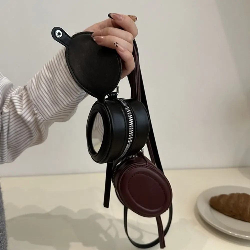 Elegant PU Leather Hanging Neck Coin Purse Oval with Makeup Mirror Lanyard Wallet Mini Cute Earphone Bag Girls/Female
Elegant PU Leather Hanging Neck Coin Purse Oval with Makeup Mirror Lanyard Wallet Mini Cute Earphone Bag Girls/Female