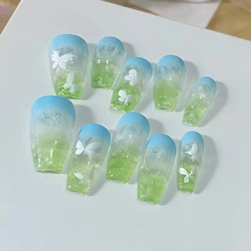 Blue and green gradual change wearing nail long butterfly nail piece fake nail piece
Blue and green gradual change wearing nail long butterfly nail piece fake nail piece