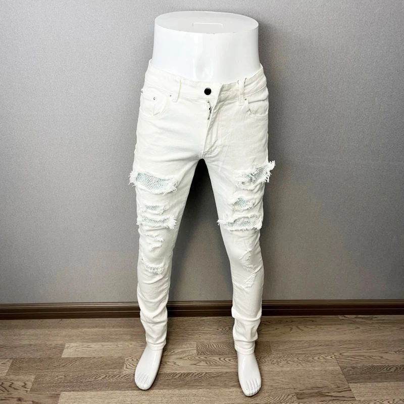 Fashionable new men's jeans with perforated patches, washed with water, nostalgic perforated patches, white jeans, high street h
Fashionable new men's jeans with perforated patches, washed with water, nostalgic perforated patches, white jeans, high street h