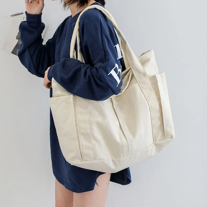 Korean Version of Simple Canvas Large Capacity Handbag Female Short Trip Bag Leisure Sports Fitness Bag Student Handbag
Korean Version of Simple Canvas Large Capacity Handbag Female Short Trip Bag Leisure Sports Fitness Bag Student Handbag