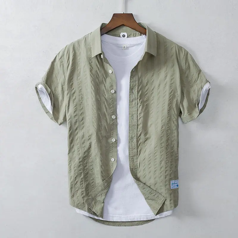 Summer New Solid Color Fashion Turn-down Collar Shirt Man High Street Casual Button Short Sleeve Cardigan Pure Cotton Y2K Tops
Summer New Solid Color Fashion Turn-down Collar Shirt Man High Street Casual Button Short Sleeve Cardigan Pure Cotton Y2K Tops