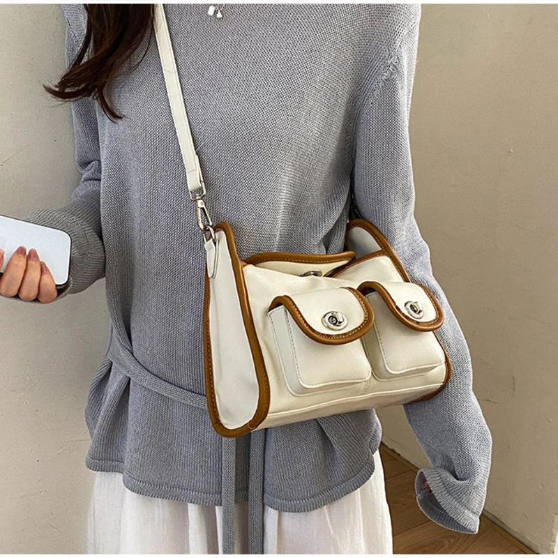 Fashion Solid Color Multi Pocket Shoulder Bag Niche Buckle Design Simple Crossbody Bag Large Capacity Women's Commuting Handbag
Fashion Solid Color Multi Pocket Shoulder Bag Niche Buckle Design Simple Crossbody Bag Large Capacity Women's Commuting Handbag