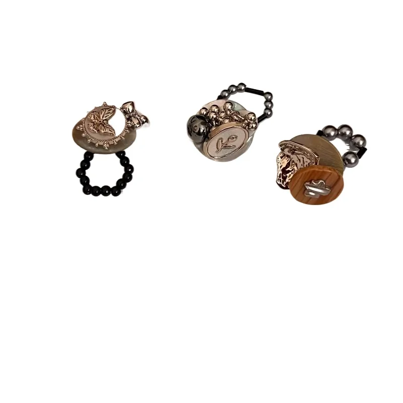 New Chinese antique button shell handmade beaded ring, female retro cold wind elastic rope adjustable ring
New Chinese antique button shell handmade beaded ring, female retro cold wind elastic rope adjustable ring