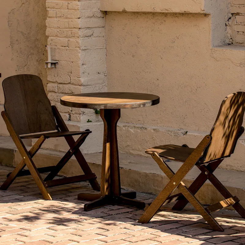 Small apartment balcony living room home leisure square table folding chair solid wood coffee shop B & B
Small apartment balcony living room home leisure square table folding chair solid wood coffee shop B & B