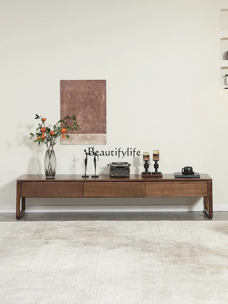 Nordic solid wood TV cabinet modern simple small apartment black walnut floor
Nordic solid wood TV cabinet modern simple small apartment black walnut floor