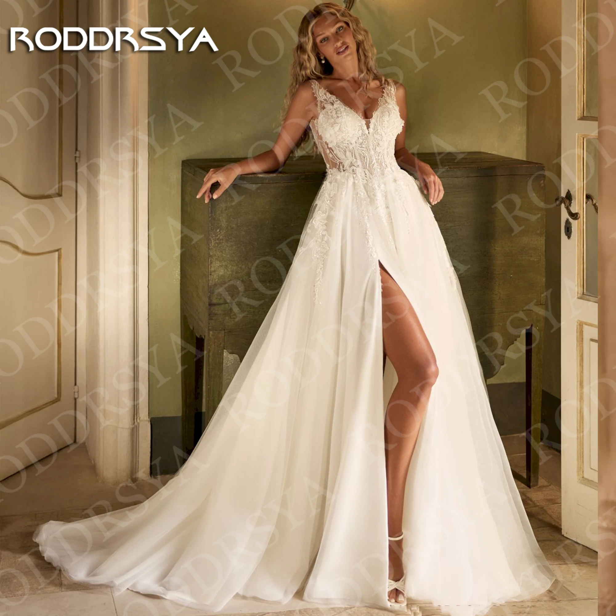 RODDRSYA Wedding Dresses Tulle Lace Applique Princess Bridal Gowns V Neck High Slit A Line Bohemian Bride Dress Woman Customized
RODDRSYA Wedding Dresses Tulle Lace Applique Princess Bridal Gowns V Neck High Slit A Line Bohemian Bride Dress Woman Customized