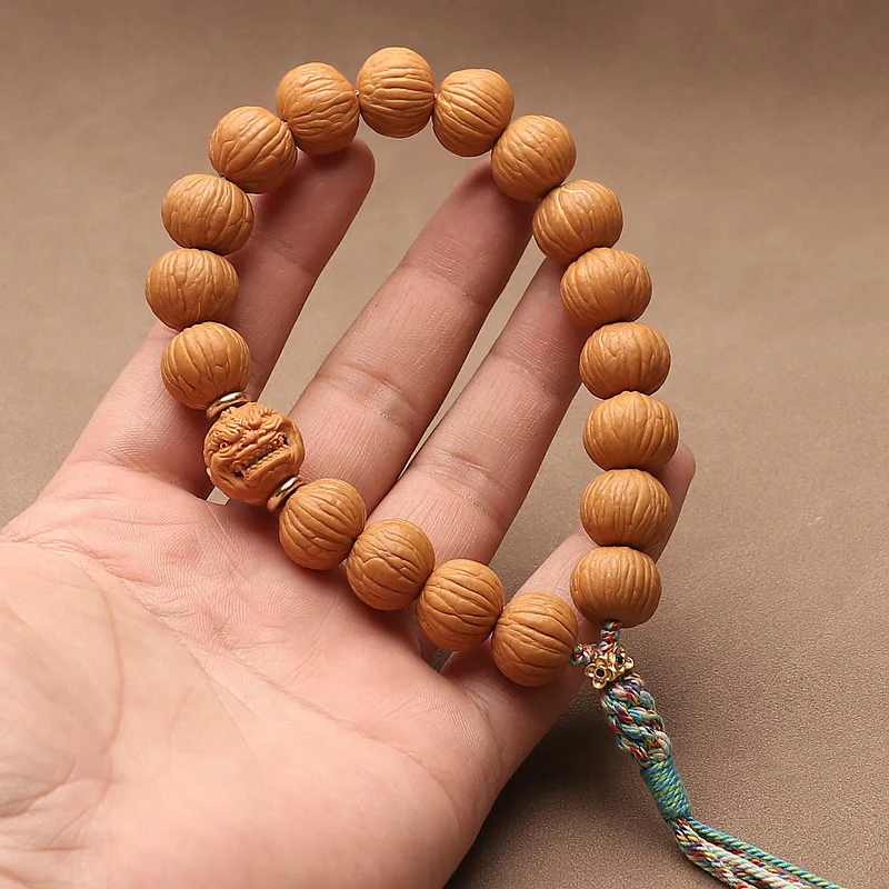 Monkey Head Walnut Bracelet: Phoenix Feather Ghost Eye Monk Seed DIY Wenwan Handheld, Gift for Men & Women
Monkey Head Walnut Bracelet: Phoenix Feather Ghost Eye Monk Seed DIY Wenwan Handheld, Gift for Men & Women