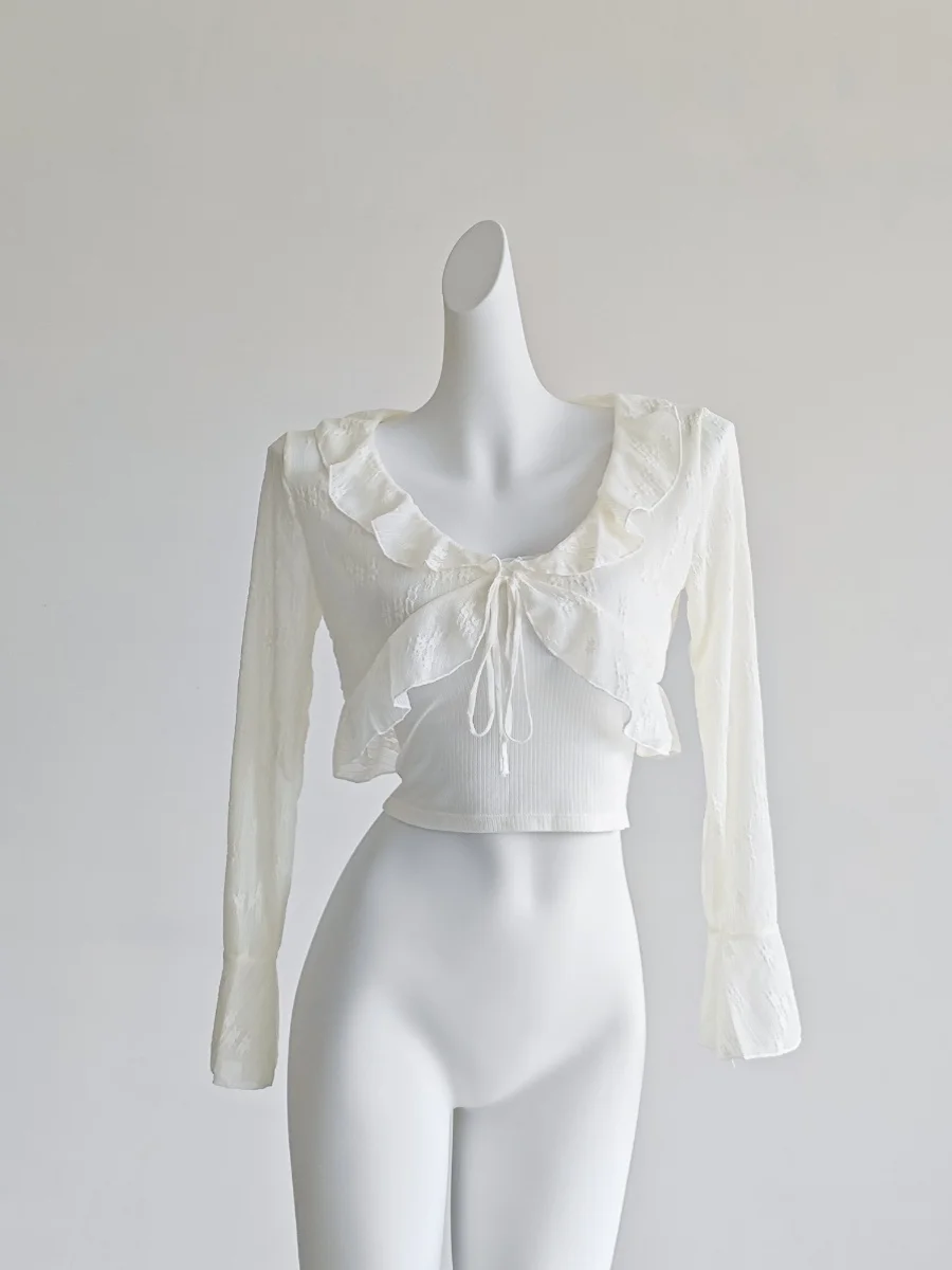 Французская тонкая солнцезащитная блузка с рюшами для женщин осенью абрикосового цвета с короткой шалью и подтяжками, кардиган, топ
Французская тонкая солнцезащитная блузка с рюшами для женщин осенью абрикосового цвета с короткой шалью и подтяжками, кардиган, топ