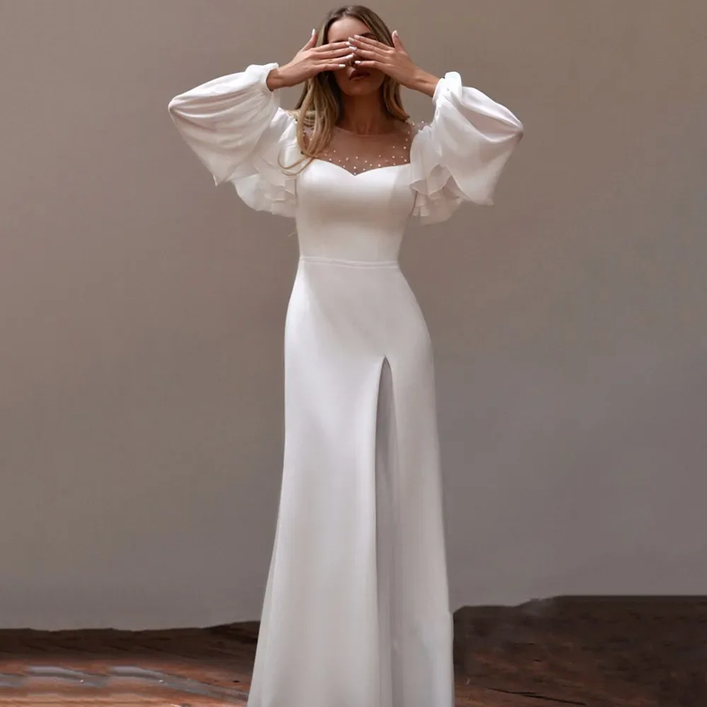Elegant and stylish transparent O-neck A-line Wedding dress Long puffy sleeves Bride dress Pearl wedding dress custom
Elegant and stylish transparent O-neck A-line Wedding dress Long puffy sleeves Bride dress Pearl wedding dress custom