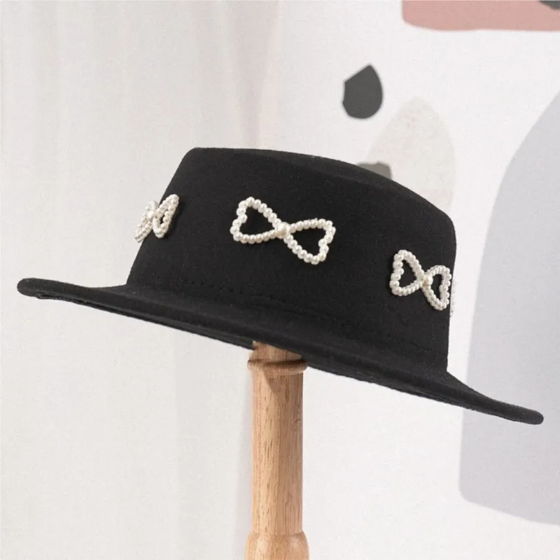 Black felt flat-topped top hat with pearl Festival decoration sweet and cool face-enhancing exquisite daily style
Black felt flat-topped top hat with pearl Festival decoration sweet and cool face-enhancing exquisite daily style