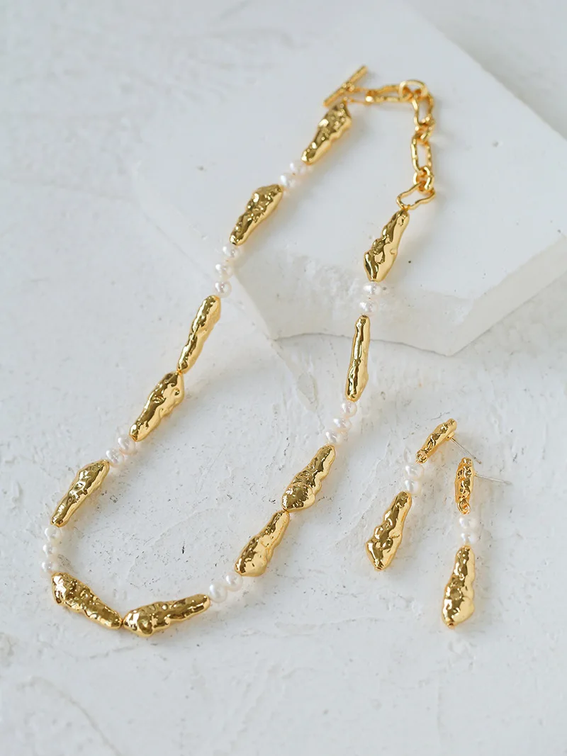 Geometric Irregular Metal Toothpaste Clavicle Chain Female Ins Style Splicing Round Pearl Necklace Earring Set
Geometric Irregular Metal Toothpaste Clavicle Chain Female Ins Style Splicing Round Pearl Necklace Earring Set