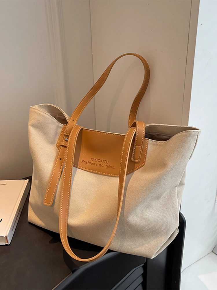 Large Capacity Canvas Shoulder Bag Women's Fashionable Summer Casual Versatile Commuter Bag Tote Bag Soft Fabric Zipper Closure
Large Capacity Canvas Shoulder Bag Women's Fashionable Summer Casual Versatile Commuter Bag Tote Bag Soft Fabric Zipper Closure