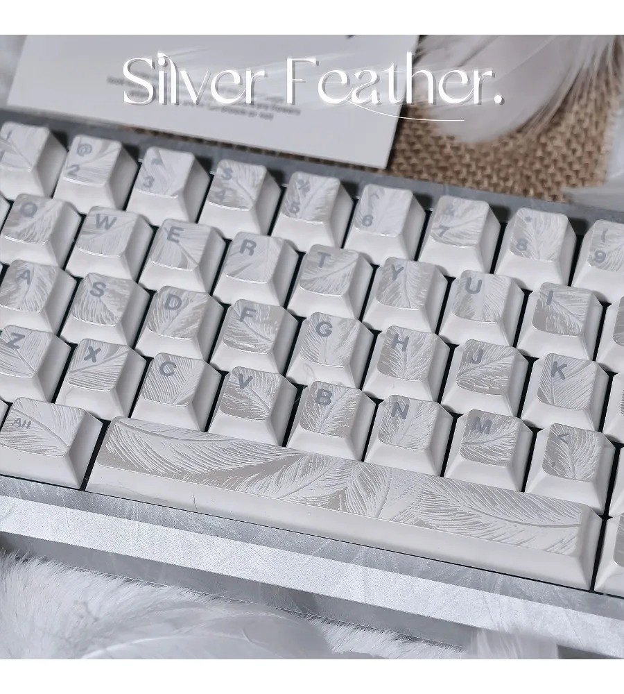 Mint white silver feather embossed feather pattern mechanical keyboard keycap custom magnetic axis PBT hot sublimation
Mint white silver feather embossed feather pattern mechanical keyboard keycap custom magnetic axis PBT hot sublimation