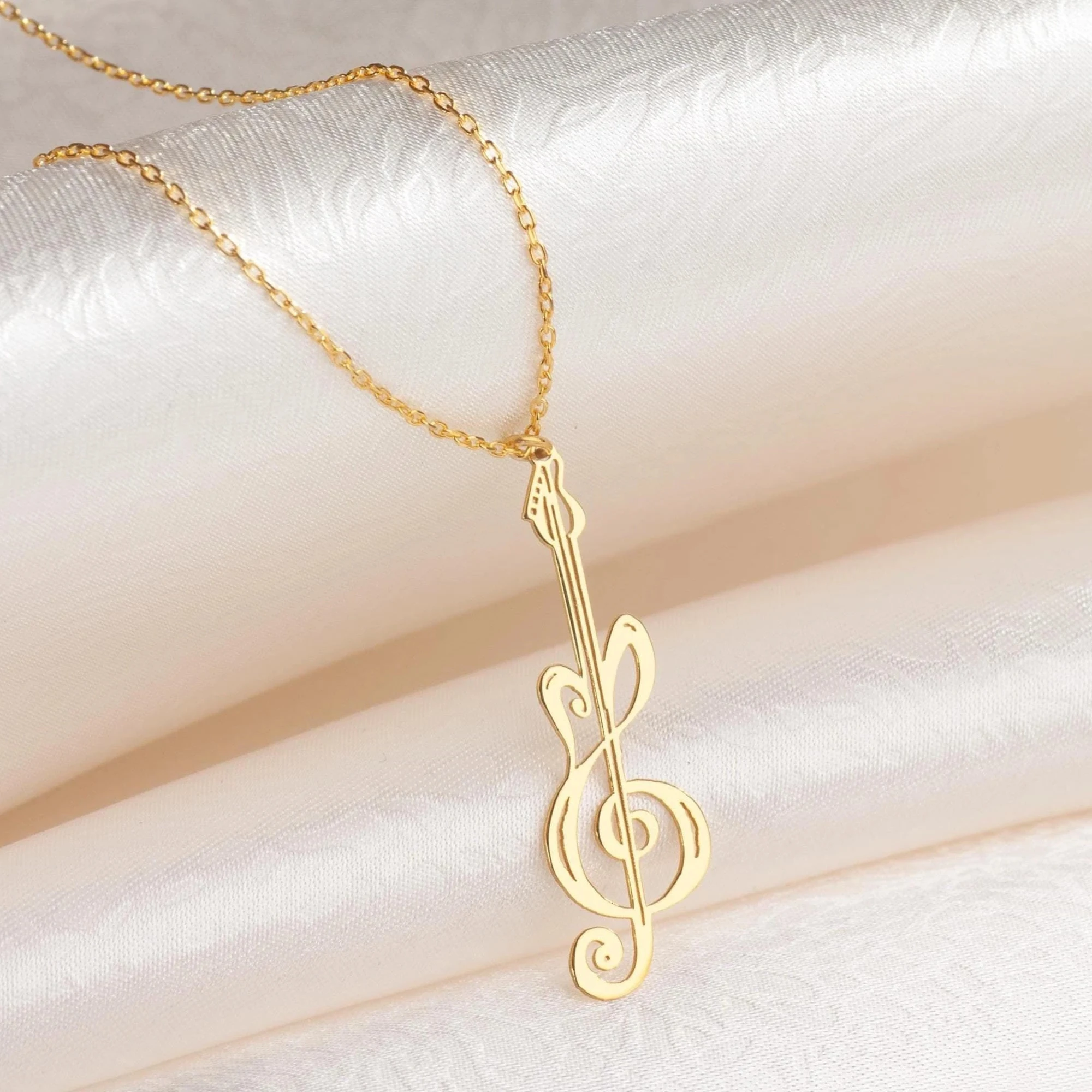 Guitar Treble Clef Necklace, Guitarist Gift, Musician Pendant, Music Lover Gift, Note Jewelry for Electric Guitar Player
Guitar Treble Clef Necklace, Guitarist Gift, Musician Pendant, Music Lover Gift, Note Jewelry for Electric Guitar Player
