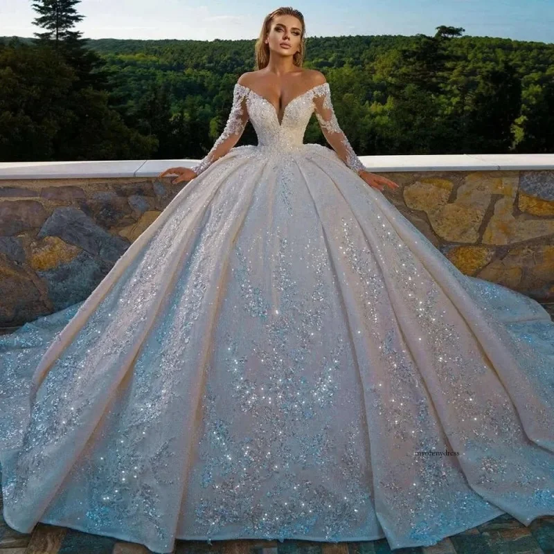 Sparkly Lace Princess Wedding Gown Deep V Off Shoulder Sheer Long Sleeves 3D Flower Crystal Sequins Oversized Voluminous Skirt
Sparkly Lace Princess Wedding Gown Deep V Off Shoulder Sheer Long Sleeves 3D Flower Crystal Sequins Oversized Voluminous Skirt