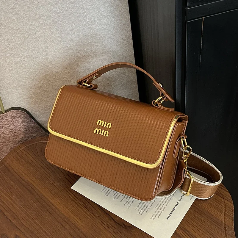 Elegant Textured Leather Tote With Trendy Design And Spacious Interior Designed Also As A Versatile Commuter Ladies Diaper Bag
Elegant Textured Leather Tote With Trendy Design And Spacious Interior Designed Also As A Versatile Commuter Ladies Diaper Bag