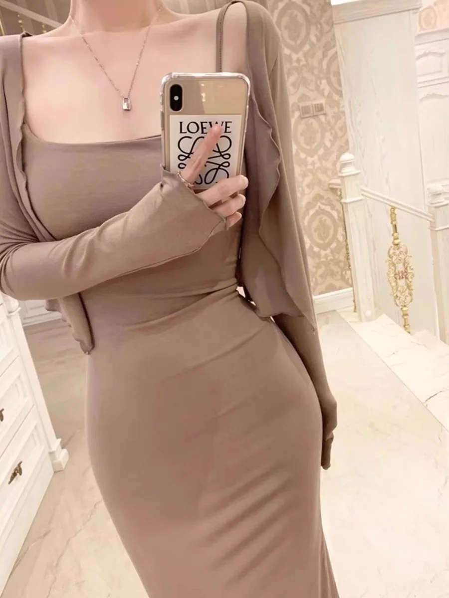 Pure Desire Sexy Girl Strap Dress Women's Autumn Winter New High-End Slimming Cardigan Outerwear Two-Piece Set Korean Style
Pure Desire Sexy Girl Strap Dress Women's Autumn Winter New High-End Slimming Cardigan Outerwear Two-Piece Set Korean Style