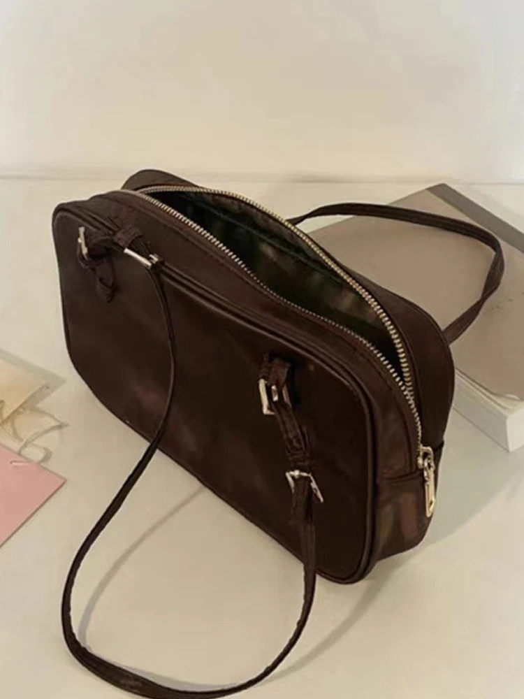 TRSYPHXM 2025 new niche bag, women's solid color texture, handheld commuting compact shoulder bag
TRSYPHXM 2025 new niche bag, women's solid color texture, handheld commuting compact shoulder bag