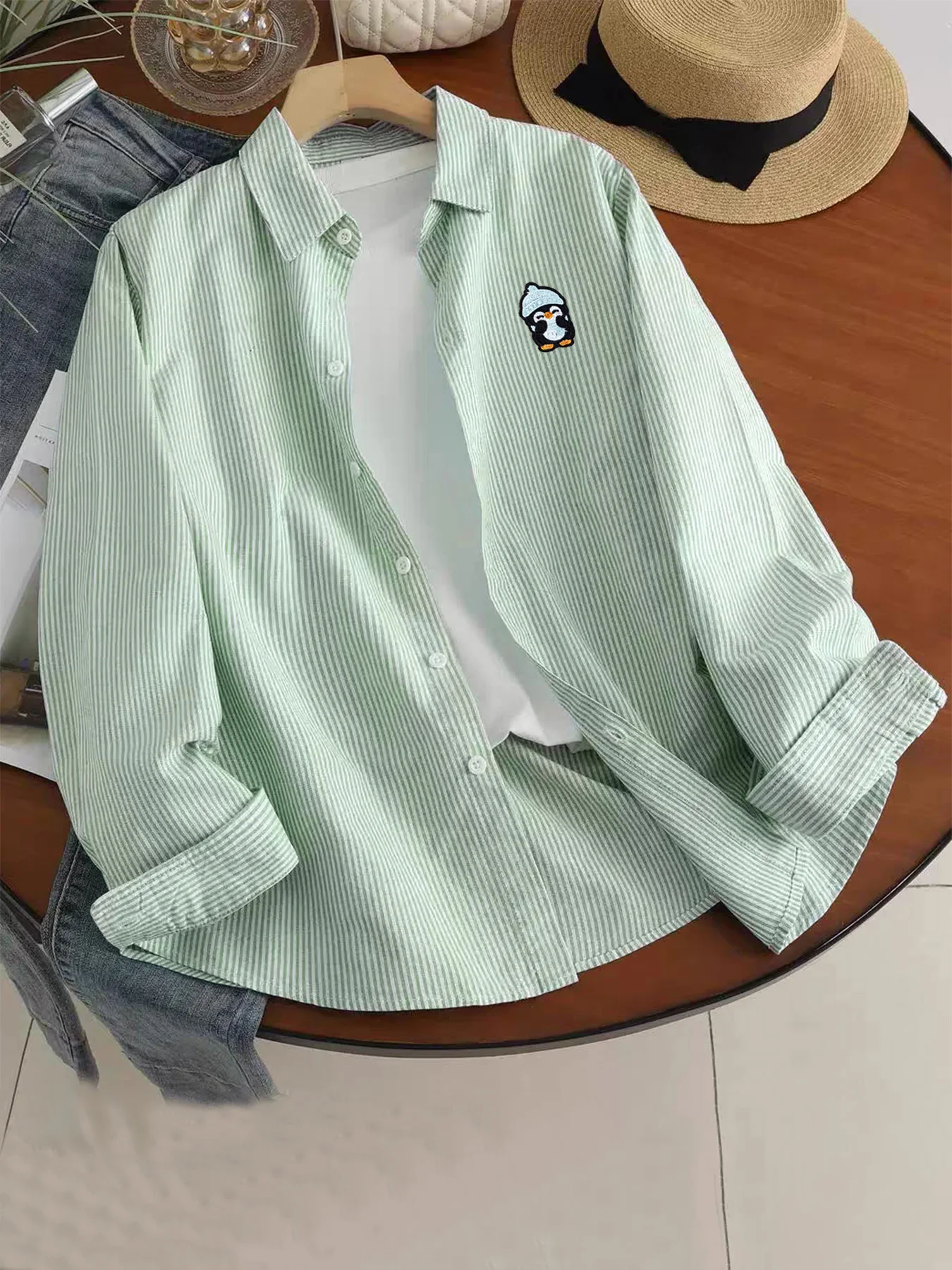 Trendy men's casual shirt with fun cartoon penguin design, long-sleeve, spring and autumn fashion wear
Trendy men's casual shirt with fun cartoon penguin design, long-sleeve, spring and autumn fashion wear