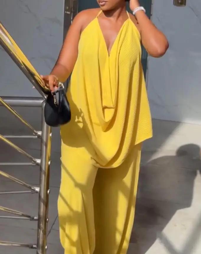 Alluring Sleeveless Pleated Top and Wide - Leg Pants Ensemble for Effortless Style
Alluring Sleeveless Pleated Top and Wide - Leg Pants Ensemble for Effortless Style