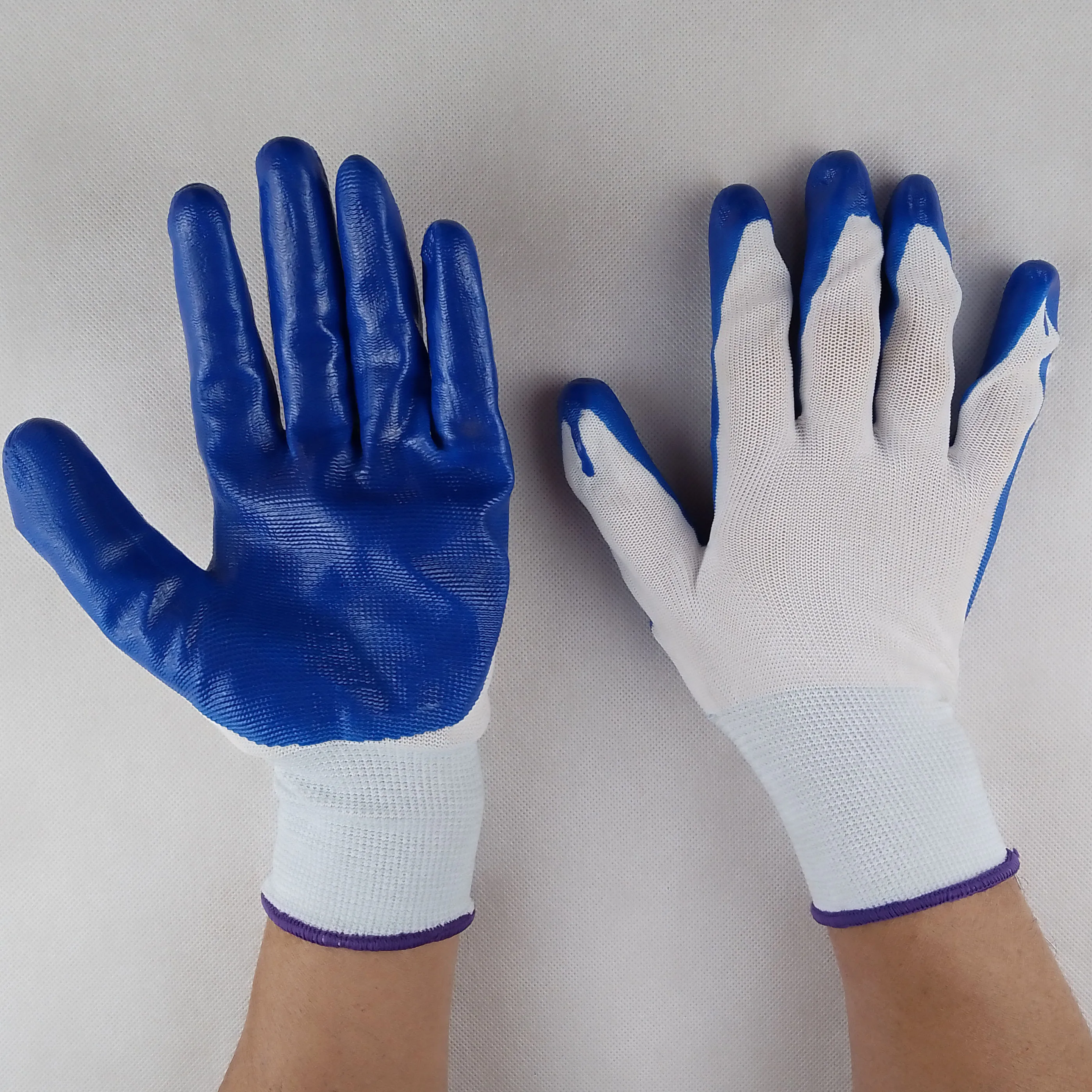 oem противоскользящие износостойкие дышащие белые полиэстеровые синие нитриловые перчатки с пальмовым покрытием, защитные рабочие перчатки для садоводства и фабрики 
oem противоскользящие износостойкие дышащие белые полиэстеровые синие нитриловые перчатки с пальмовым покрытием, защитные рабочие перчатки для садоводства и фабрики