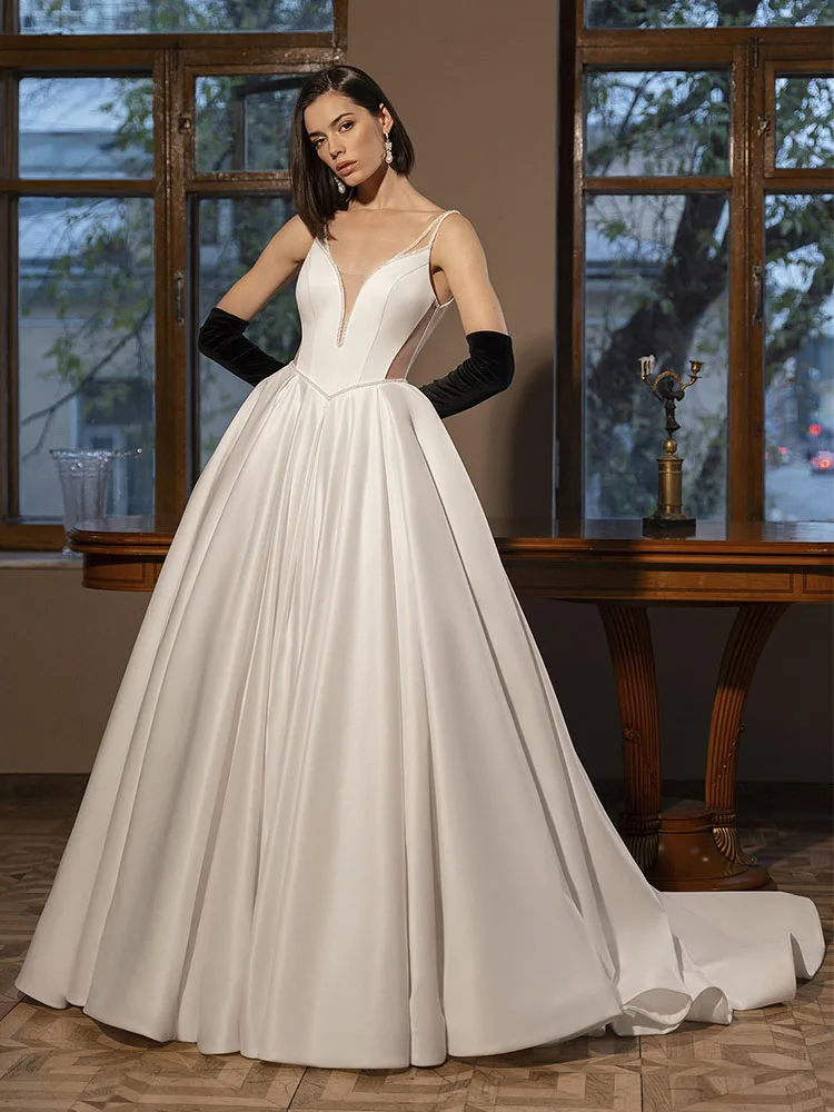 Modern Wedding Dresses for Women Deep V Neck Illusion Back Satin Wedding Gowns White A Line Sleeveless Beading Bridal Dress Long
Modern Wedding Dresses for Women Deep V Neck Illusion Back Satin Wedding Gowns White A Line Sleeveless Beading Bridal Dress Long