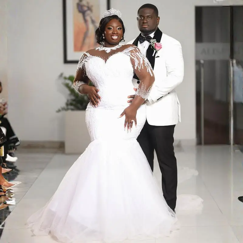 Customized Plus Size African Arabic Nigeria Illusion Trumpet Bride Sheer Neck Long Sleeves Bridal Gowns Mermaid
Customized Plus Size African Arabic Nigeria Illusion Trumpet Bride Sheer Neck Long Sleeves Bridal Gowns Mermaid