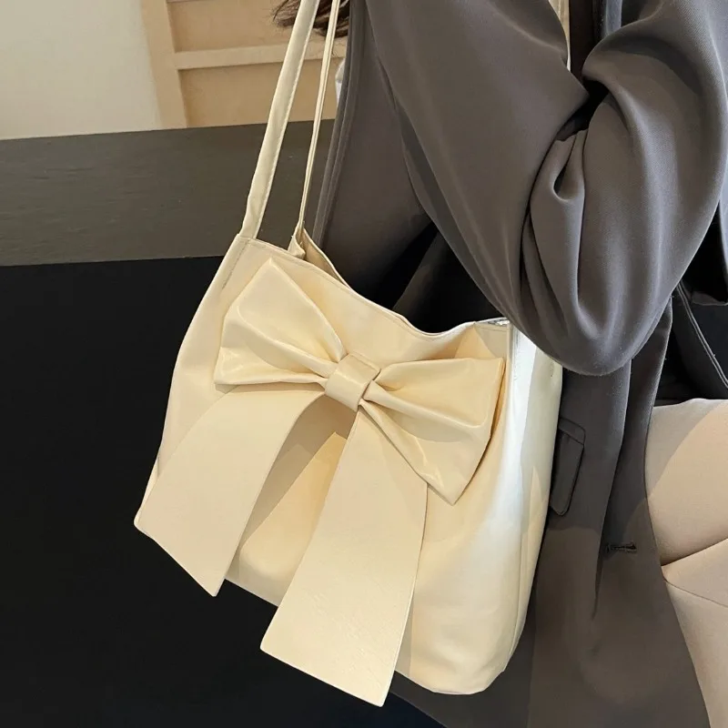 Нишевая пригородная большая сумка 2024, большая вместительная сумка на плечо с бантом для школьниц, универсальный кошелек в стиле минималистичного дизайна
Нишевая пригородная большая сумка 2024, большая вместительная сумка на плечо с бантом для школьниц, универсальный кошелек в стиле минималистичного дизайна