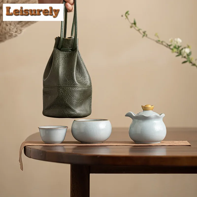 Lucky Bag Ru Kiln Фарфоровый чайный сервиз Набор дзен-чайник и чашки Набор китайского чая для пикника Портативная дорожная сумка Чайный сервиз кунг-фу
Lucky Bag Ru Kiln Фарфоровый чайный сервиз Набор дзен-чайник и чашки Набор китайского чая для пикника Портативная дорожная сумка Чайный сервиз кунг-фу