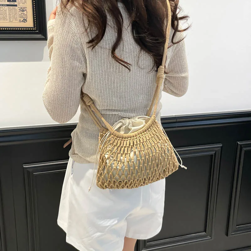 Spring Summer Hollow Small Shoulder Bag for Women 2026 New Korean Style Single Crossbody Bag Fashionable Drawstring Woven Bag
Spring Summer Hollow Small Shoulder Bag for Women 2026 New Korean Style Single Crossbody Bag Fashionable Drawstring Woven Bag