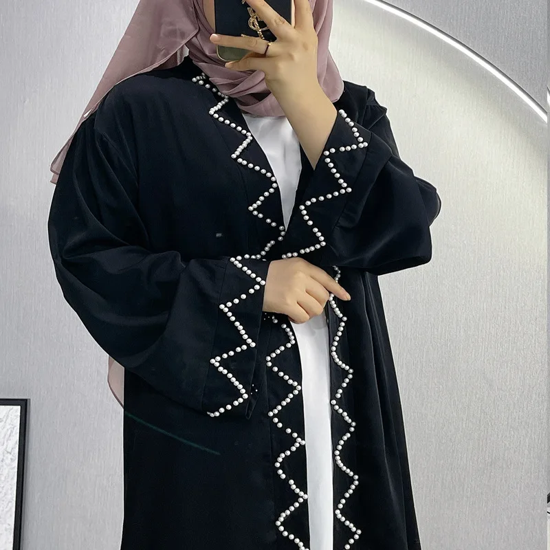 Elegant Muslim Ladies Long Sleeve Loose Fit Abaya Dress with Nail BeadsSparkling Rhinestones and Beads
Elegant Muslim Ladies Long Sleeve Loose Fit Abaya Dress with Nail BeadsSparkling Rhinestones and Beads