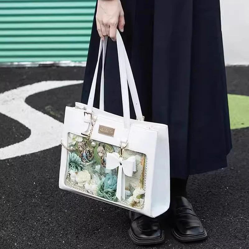 Japanese Sweet Original Bow Girl's It Bag Large Capacity Shoulder Tote Bag Girl Versatile Leather Transparent Bag 
Japanese Sweet Original Bow Girl's It Bag Large Capacity Shoulder Tote Bag Girl Versatile Leather Transparent Bag