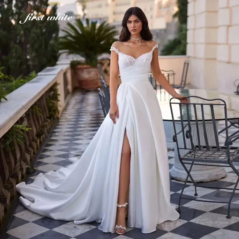 Элегантное свадебное платье трапециевидной формы с открытыми плечами по индивидуальному заказу, халат с бисером и блестками, кружевное свадебное платье с разрезом по бокам, атласное платье Vestido de novia
Элегантное свадебное платье трапециевидной формы с открытыми плечами по индивидуальному заказу, халат с бисером и блестками, кружевное свадебное платье с разрезом по бокам, атласное платье Vestido de novia