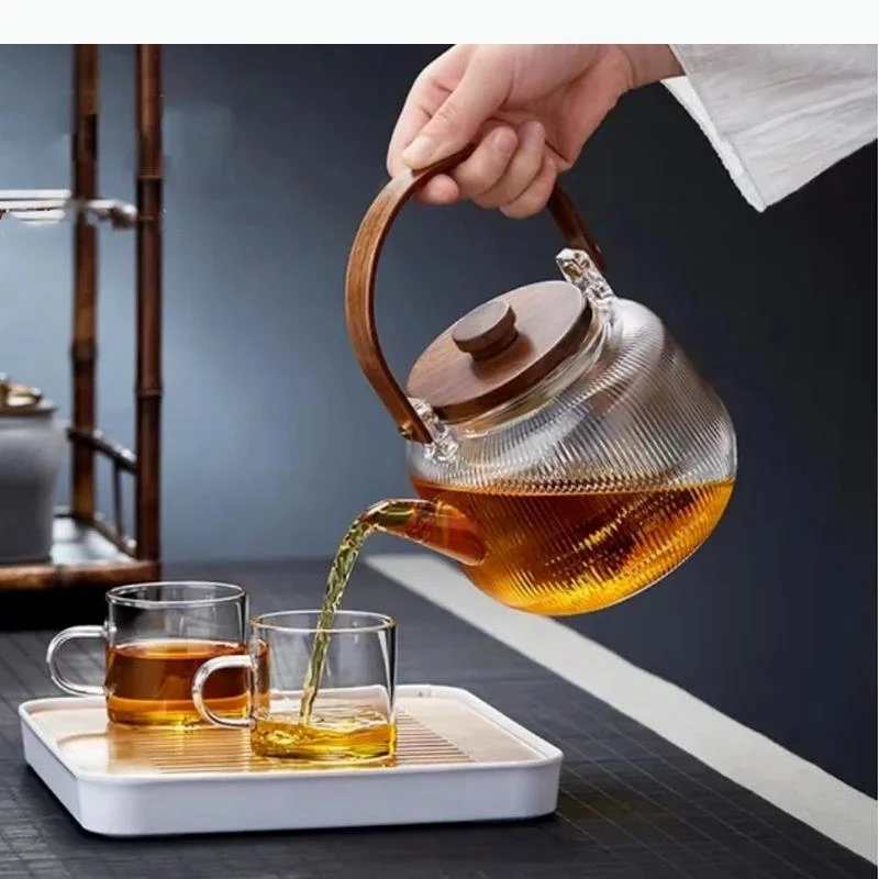 Прозрачный стеклянный чайник с деревянной ручкой, чайник с подогревом, чайная чашка, инструменты для приготовления чая, чайная посуда, заварочный чайник
Прозрачный стеклянный чайник с деревянной ручкой, чайник с подогревом, чайная чашка, инструменты для приготовления чая, чайная посуда, заварочный чайник