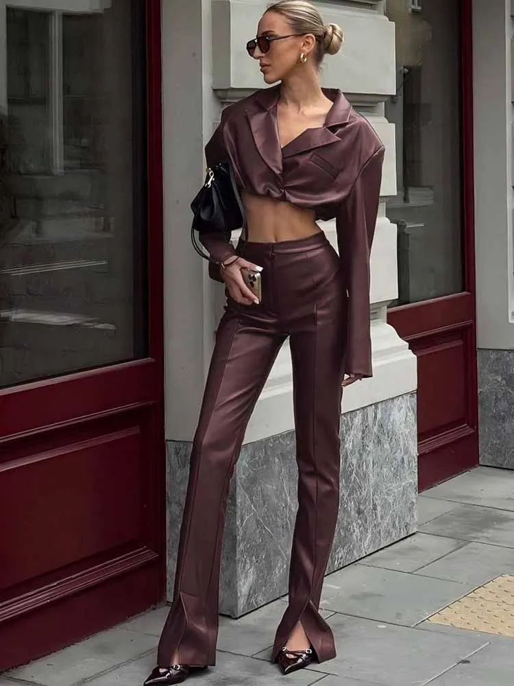 Retro leather two-piece women's V-neck long sleeved sexy crop top and split flared pants high street style
Retro leather two-piece women's V-neck long sleeved sexy crop top and split flared pants high street style