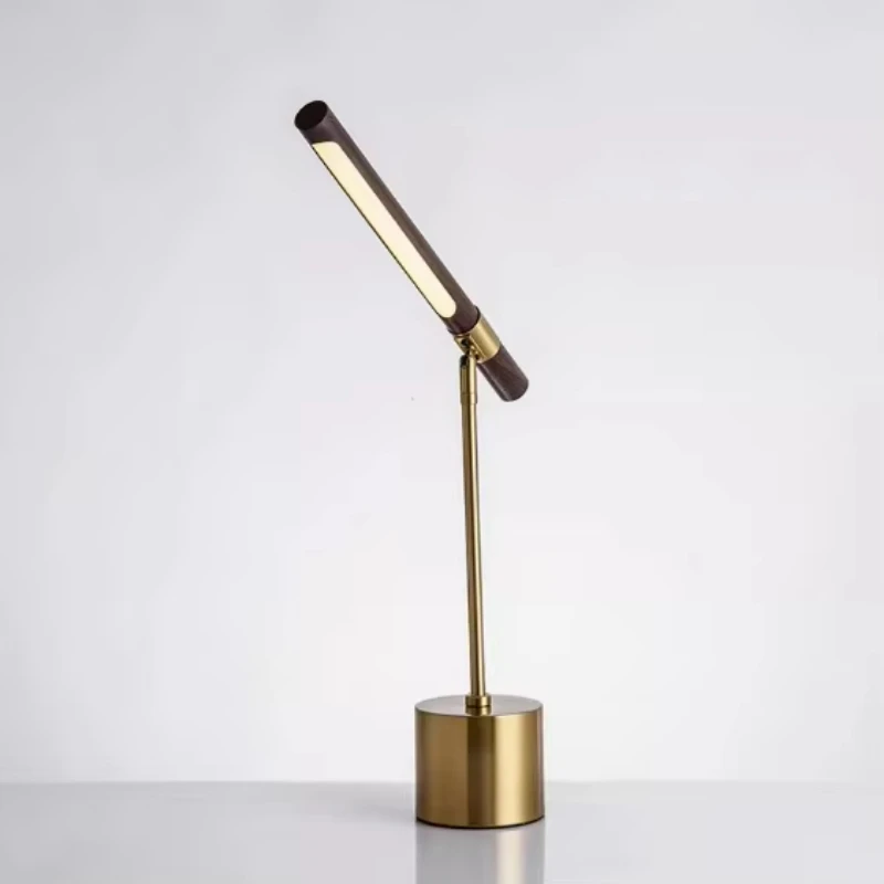 Simple gold medium and long bedroom desk lamp, iron + glass material, hotel use
Simple gold medium and long bedroom desk lamp, iron + glass material, hotel use