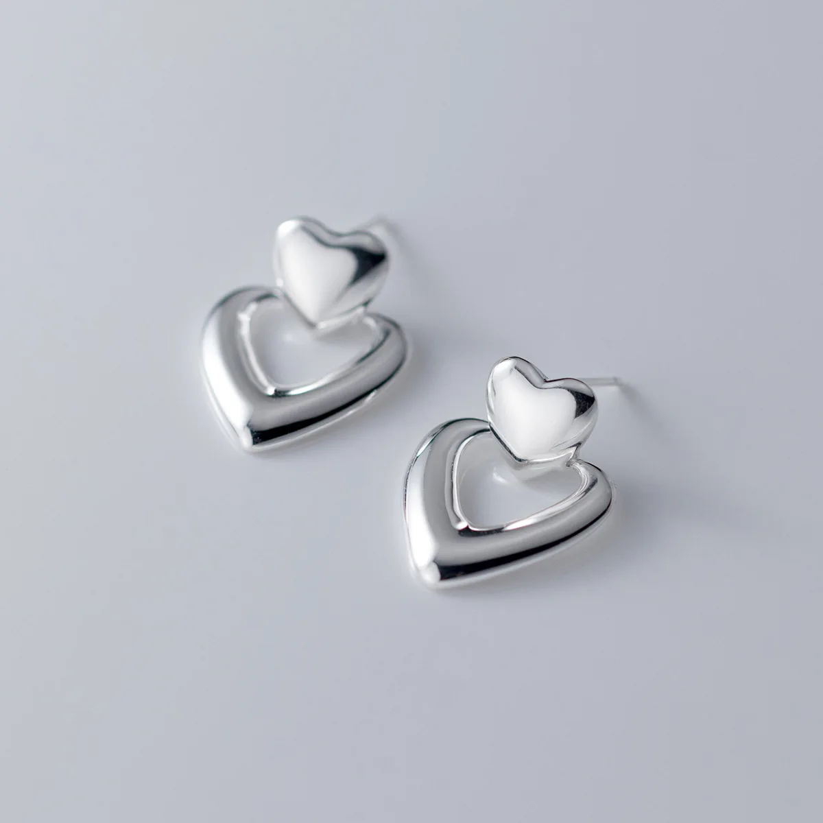 100% 925 Sterling Silver Love Heart Earrings for Women Girl Smooth Geometric Hollow Out Design Jewelry Party Gift Dropshipping
100% 925 Sterling Silver Love Heart Earrings for Women Girl Smooth Geometric Hollow Out Design Jewelry Party Gift Dropshipping