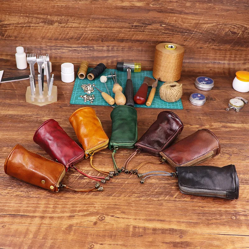Genuine leather handcrafted key bag, large-capacity zipper, car key storage, hand-held coin purse
Genuine leather handcrafted key bag, large-capacity zipper, car key storage, hand-held coin purse
