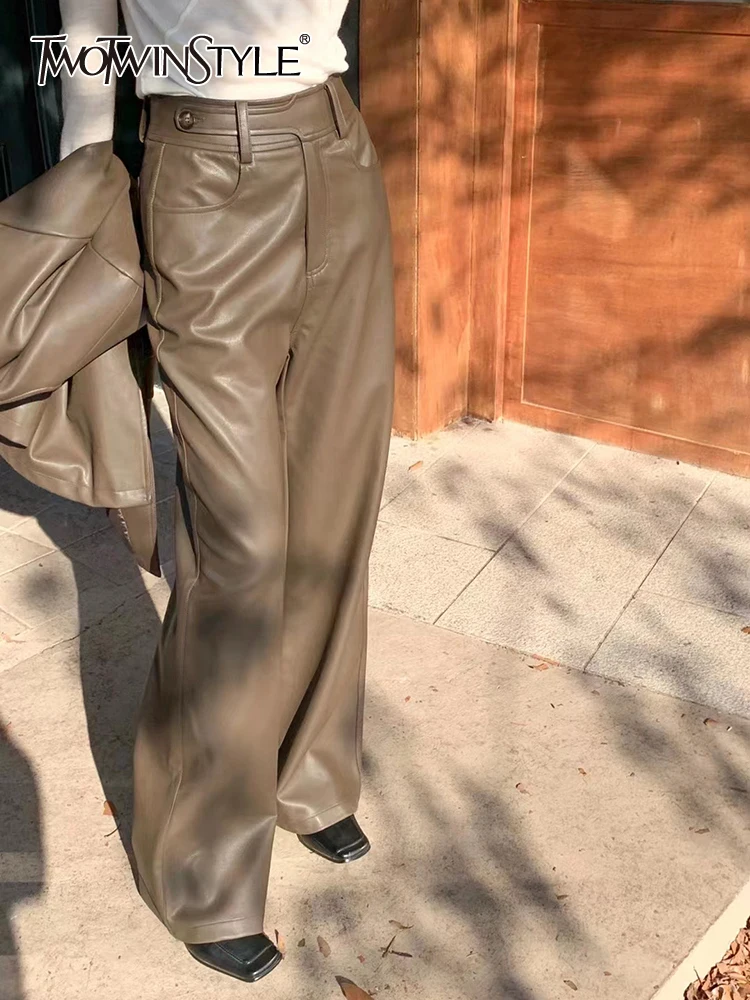 TWOTWINSTYLE Casual PU Leather Wide Leg Pants For Women High Waist Loose Solid Minimalsit Casual Trousers Female Clothing 2022
TWOTWINSTYLE Casual PU Leather Wide Leg Pants For Women High Waist Loose Solid Minimalsit Casual Trousers Female Clothing 2022