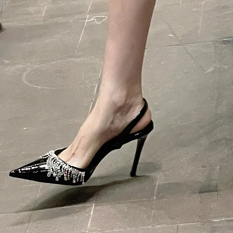 2025 new French tassel rhinester with a line back empty sandals for women thin with a celebrity temperament pointy heels
2025 new French tassel rhinester with a line back empty sandals for women thin with a celebrity temperament pointy heels