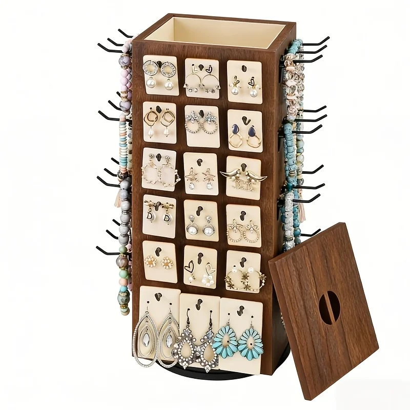 1 Jewelry Display Stand with 360° Rotating Earring Holder Features 48 Movable Hooks and a Top Storage Compartment
1 Jewelry Display Stand with 360° Rotating Earring Holder Features 48 Movable Hooks and a Top Storage Compartment