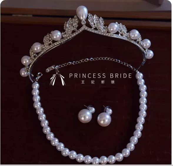 Новый изысканный и высококачественный свадебный простой костюм с жемчужной короной, аксессуары для свадебного платья, украшения для головы на день рождения
Новый изысканный и высококачественный свадебный простой костюм с жемчужной короной, аксессуары для свадебного платья, украшения для головы на день рождения