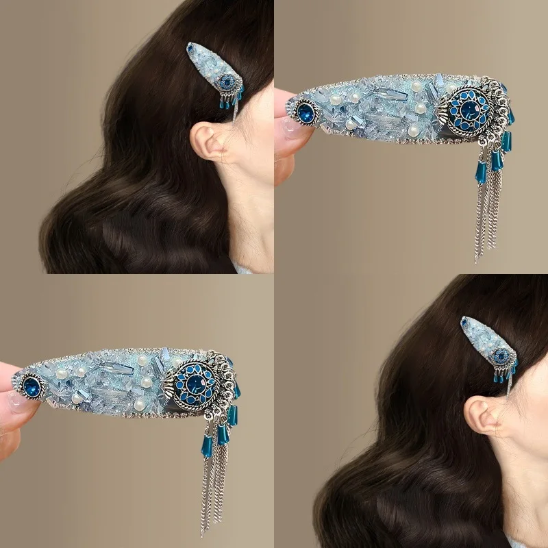 Заколка для волос с синей кисточкой прибрежного ветра, новый рельеф в китайском стиле, темперамент сбоку, зажим для капель воды, аксессуар для волос в виде диска
Заколка для волос с синей кисточкой прибрежного ветра, новый рельеф в китайском стиле, темперамент сбоку, зажим для капель воды, аксессуар для волос в виде диска