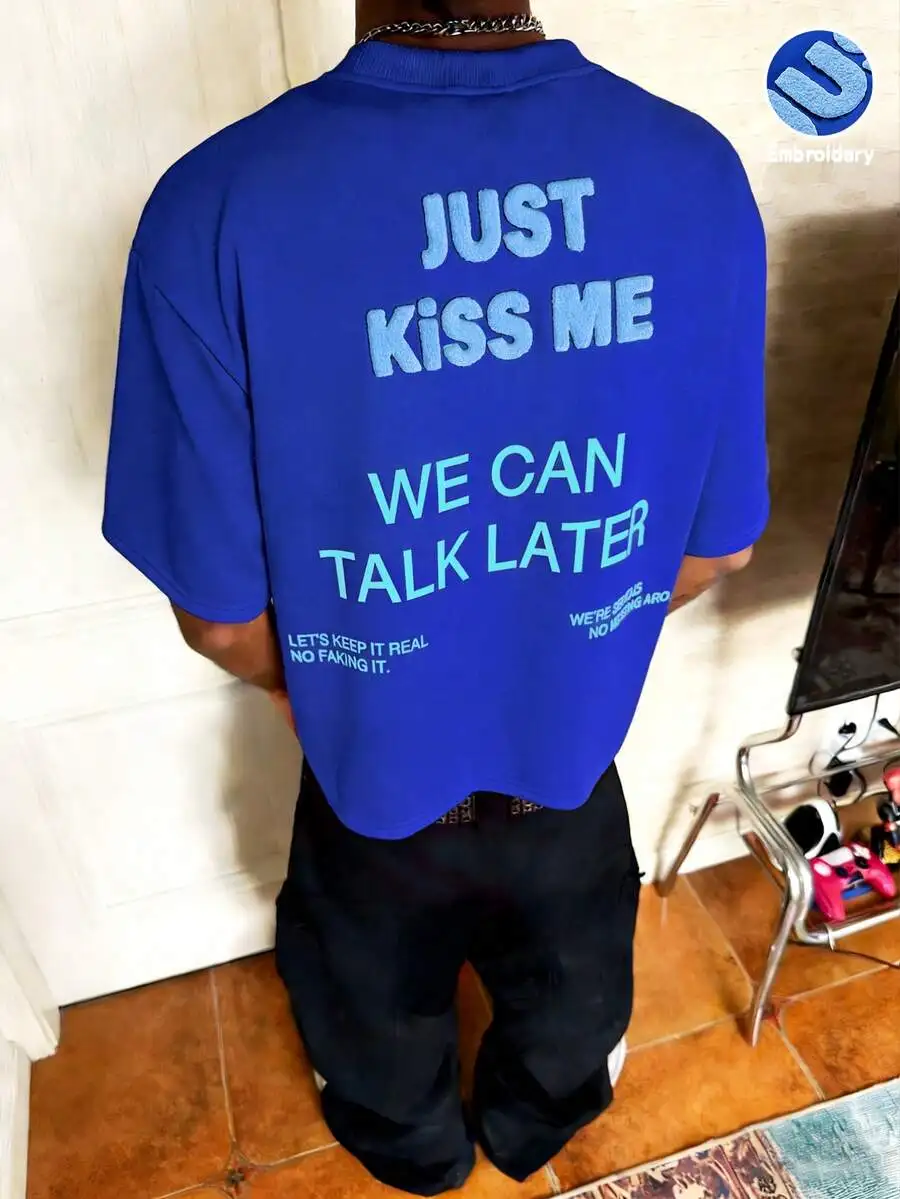 Mens Blue Embroidered T-Shirt With Humorous Text Just Kiss Me We Can Talk Later For Summer Festival Party
Mens Blue Embroidered T-Shirt With Humorous Text Just Kiss Me We Can Talk Later For Summer Festival Party