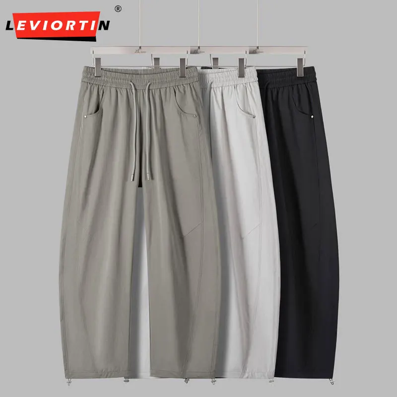 Men's Solid Color Loose Curved Pants, Summer Lightweight Breathable Sports Trousers, Loose Straight Leg Drawstring Casual Pants
Men's Solid Color Loose Curved Pants, Summer Lightweight Breathable Sports Trousers, Loose Straight Leg Drawstring Casual Pants