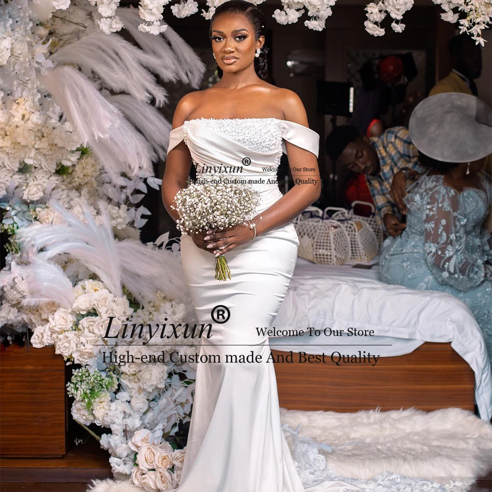 Elegant Pearls Wedding Dresses 2025 Off Shoulder Beading Mermaid Bridal Gowns Customized Sleeveless hochzeitkleider damen
Elegant Pearls Wedding Dresses 2025 Off Shoulder Beading Mermaid Bridal Gowns Customized Sleeveless hochzeitkleider damen