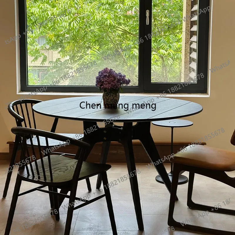 Retro solid wood round dining table Small apartment retro wabi sandy wind oak dining table
Retro solid wood round dining table Small apartment retro wabi sandy wind oak dining table